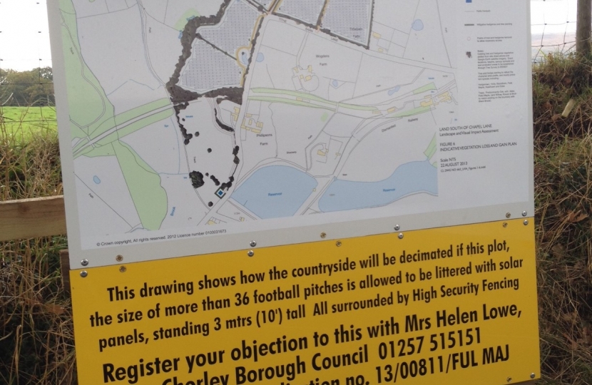 Objectors signs at location of planned solar farm in Heapey
