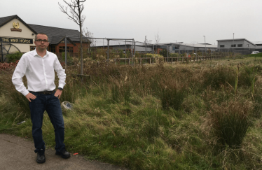 Aidy Riggott at the site of the application