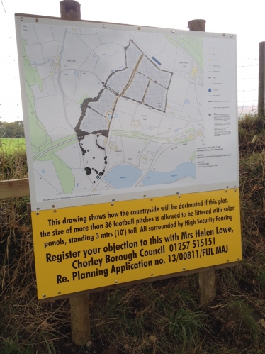 Objectors signs at location of planned solar farm in Heapey